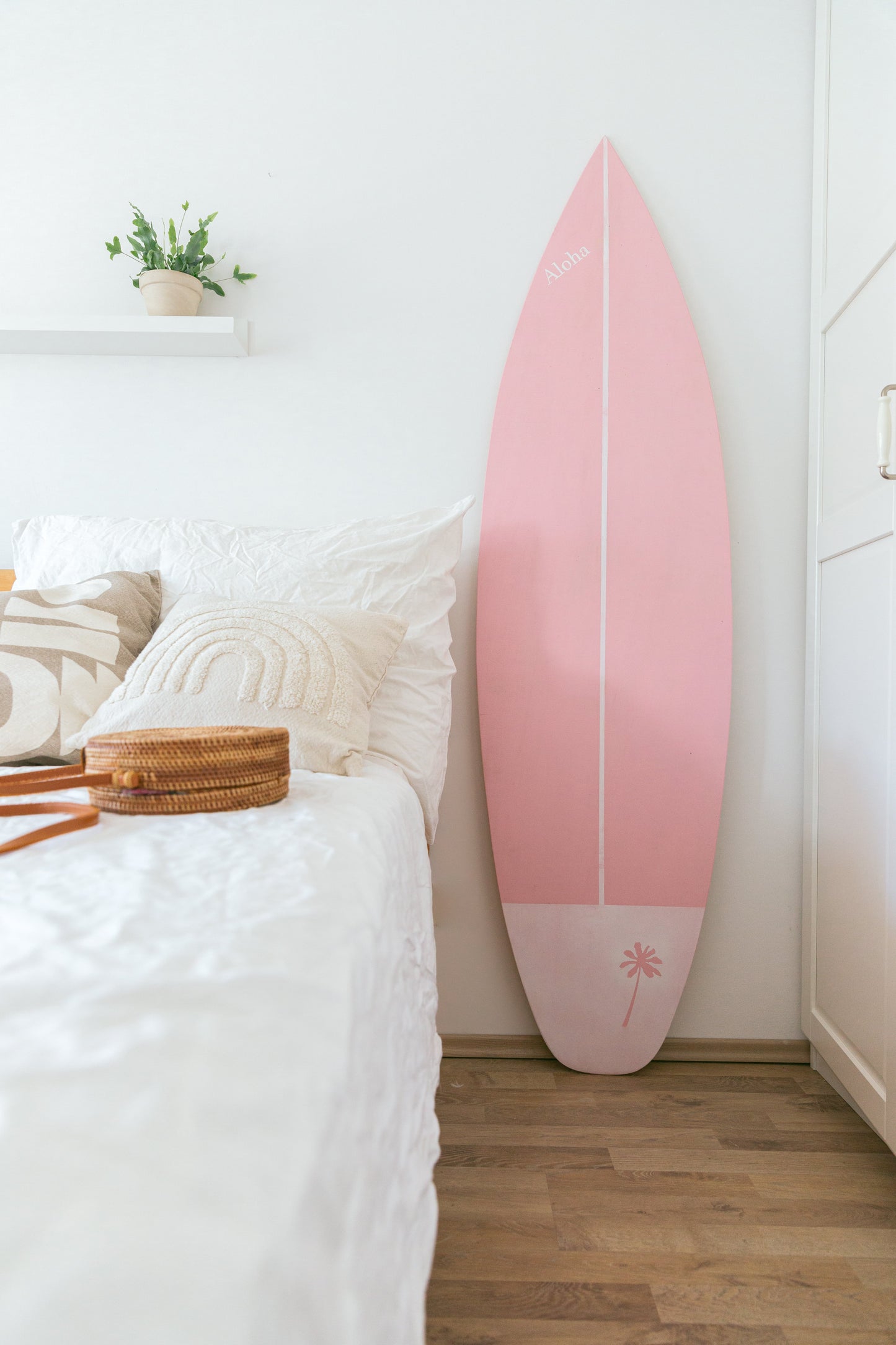 wooden decorative pink surfboard