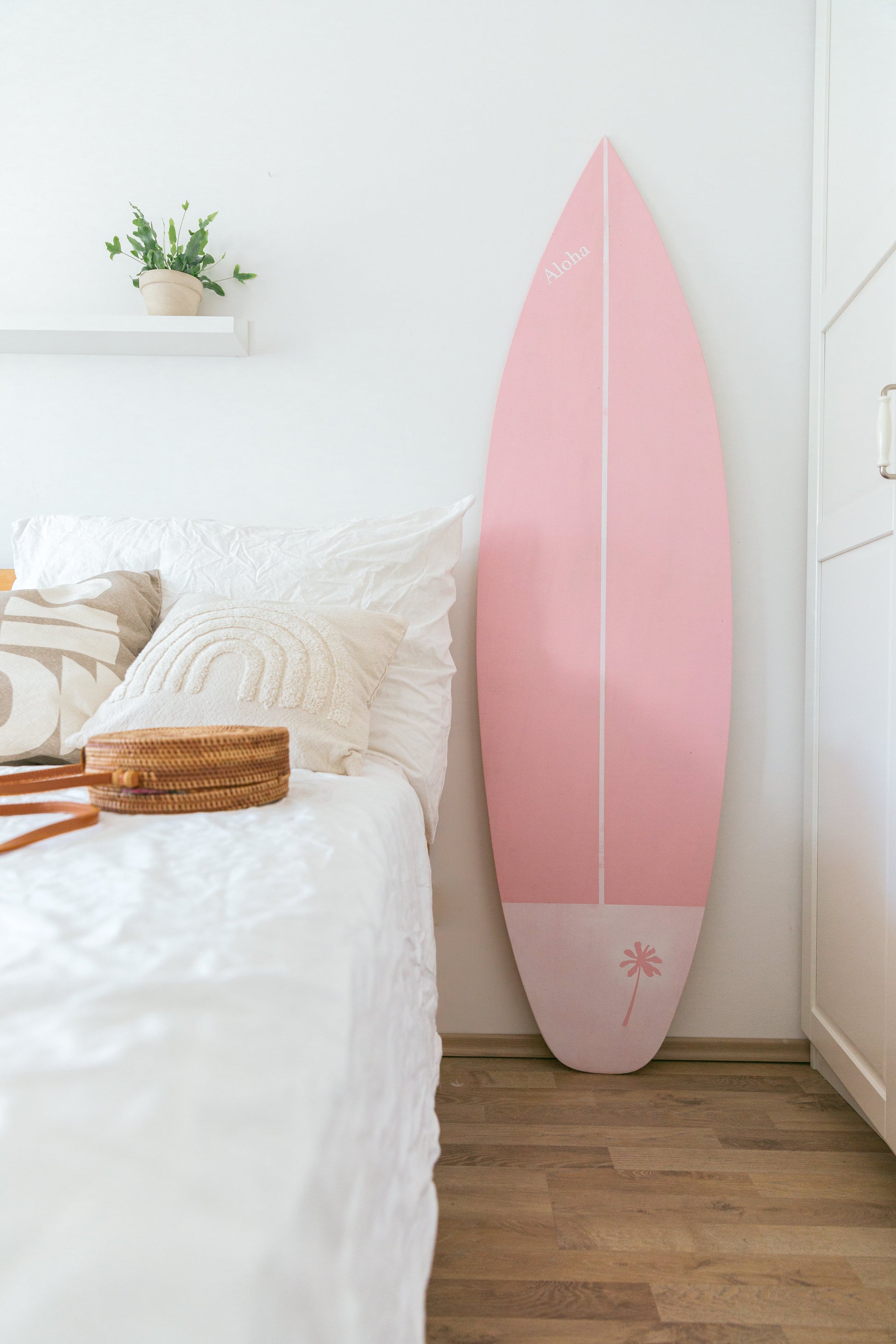 wooden decorative pink surfboard