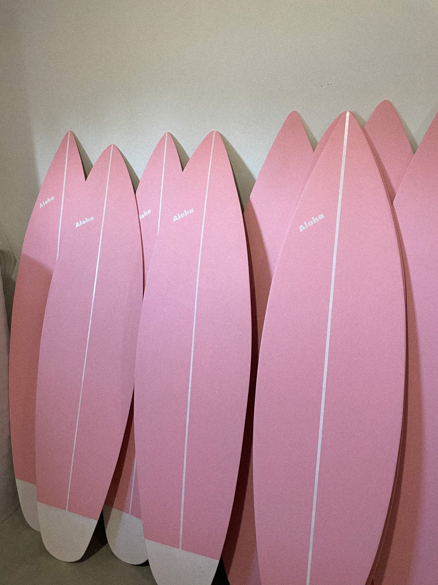 wooden decorative surfboards in baby pink 