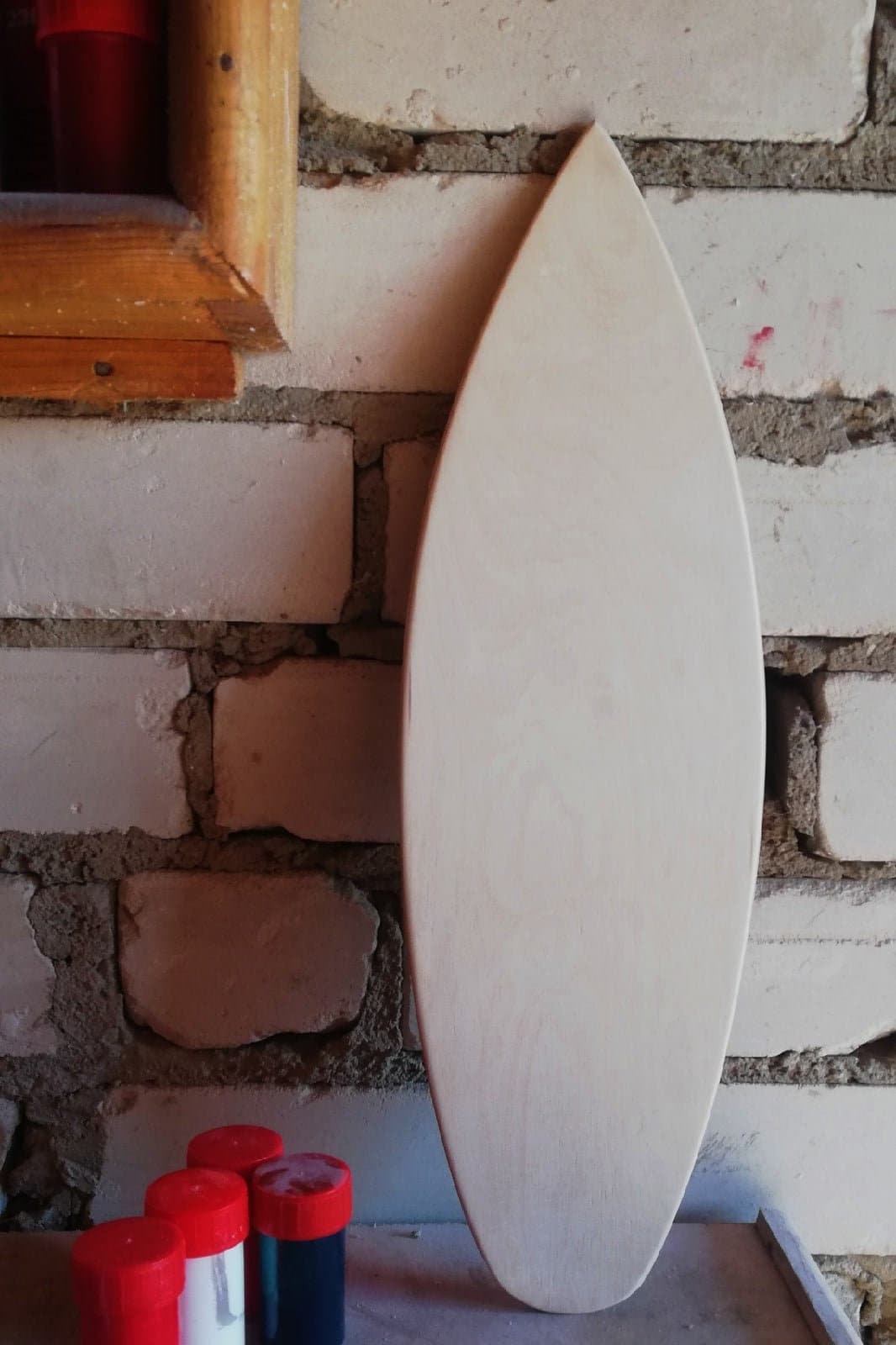 Miniature beach escapes: Wooden surfboards for charming decor