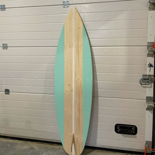 Refresh your decor: Stylish mint surfboard for a breezy ambiance