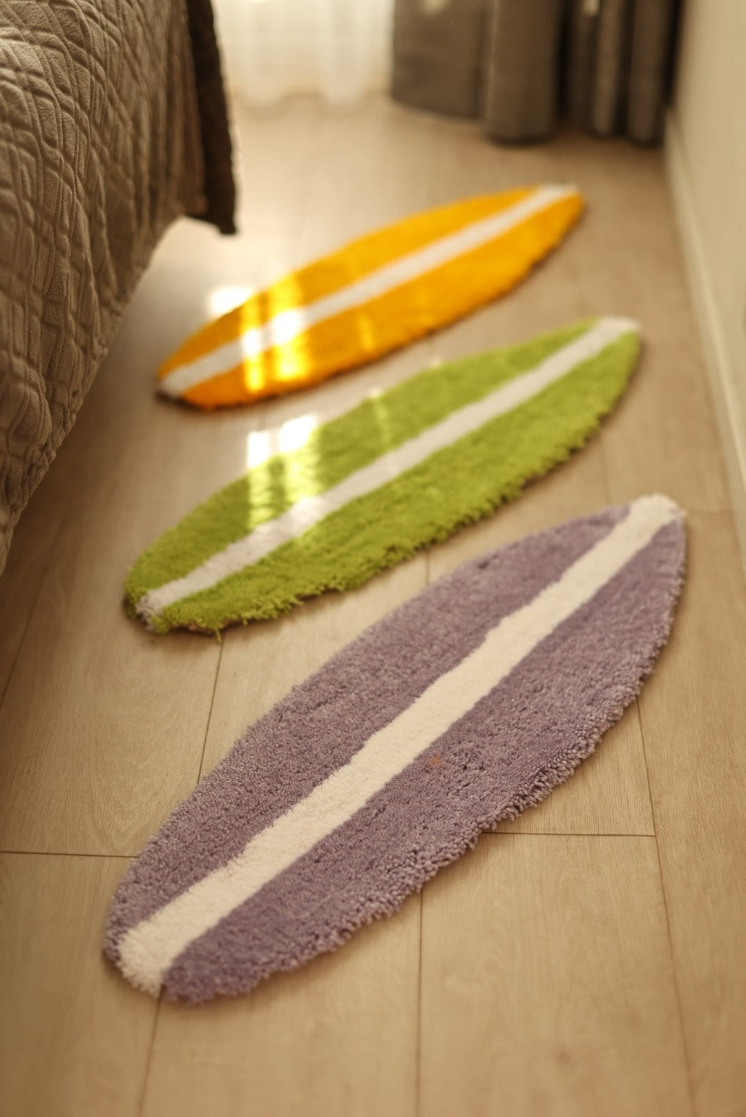 Cozy up with our surf-shaped tufted rugs, a perfect blend of comfort and coastal chic for your home