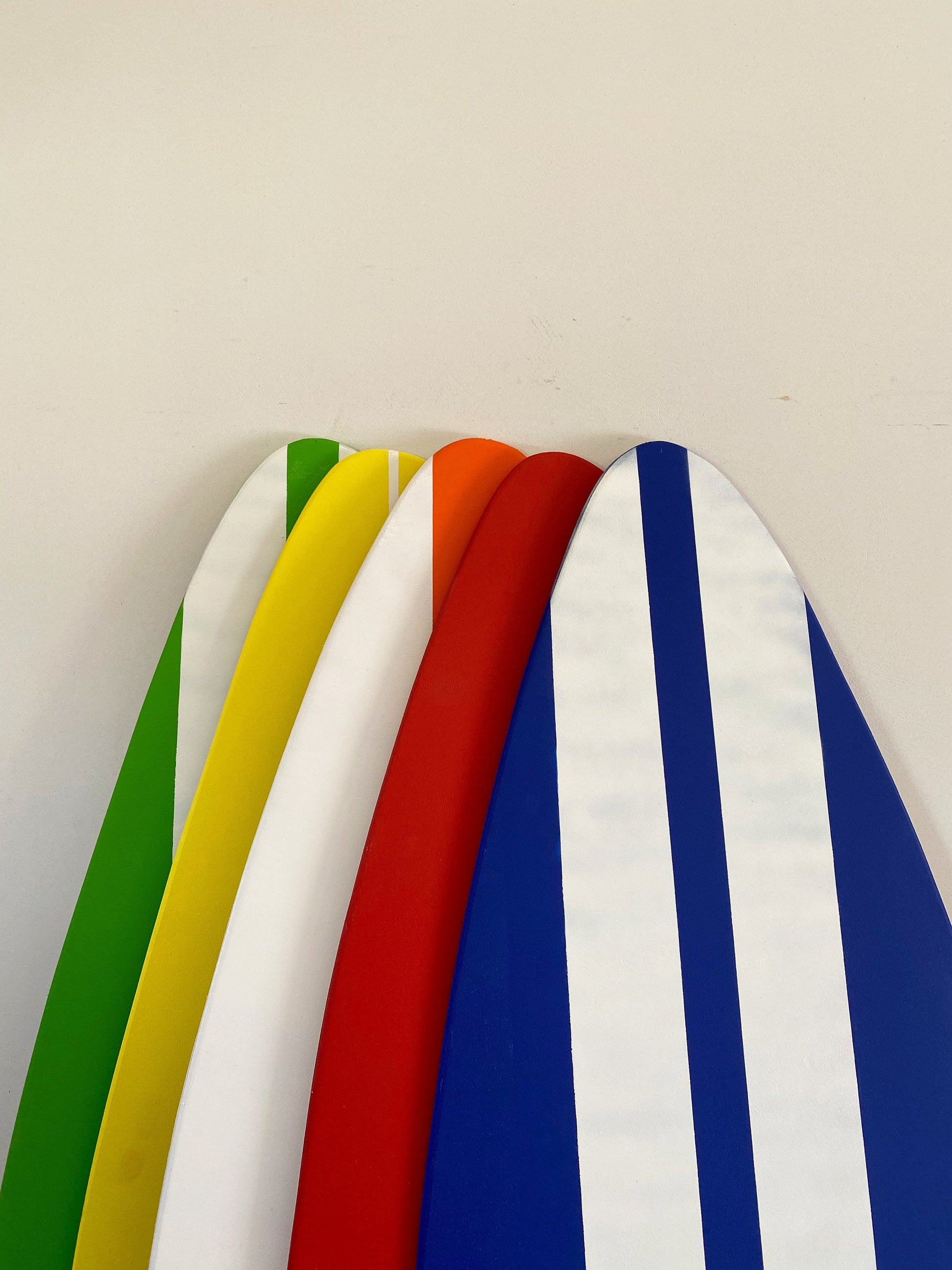 Colorful vibes, chic decor: Set of wooden surfboards for every room