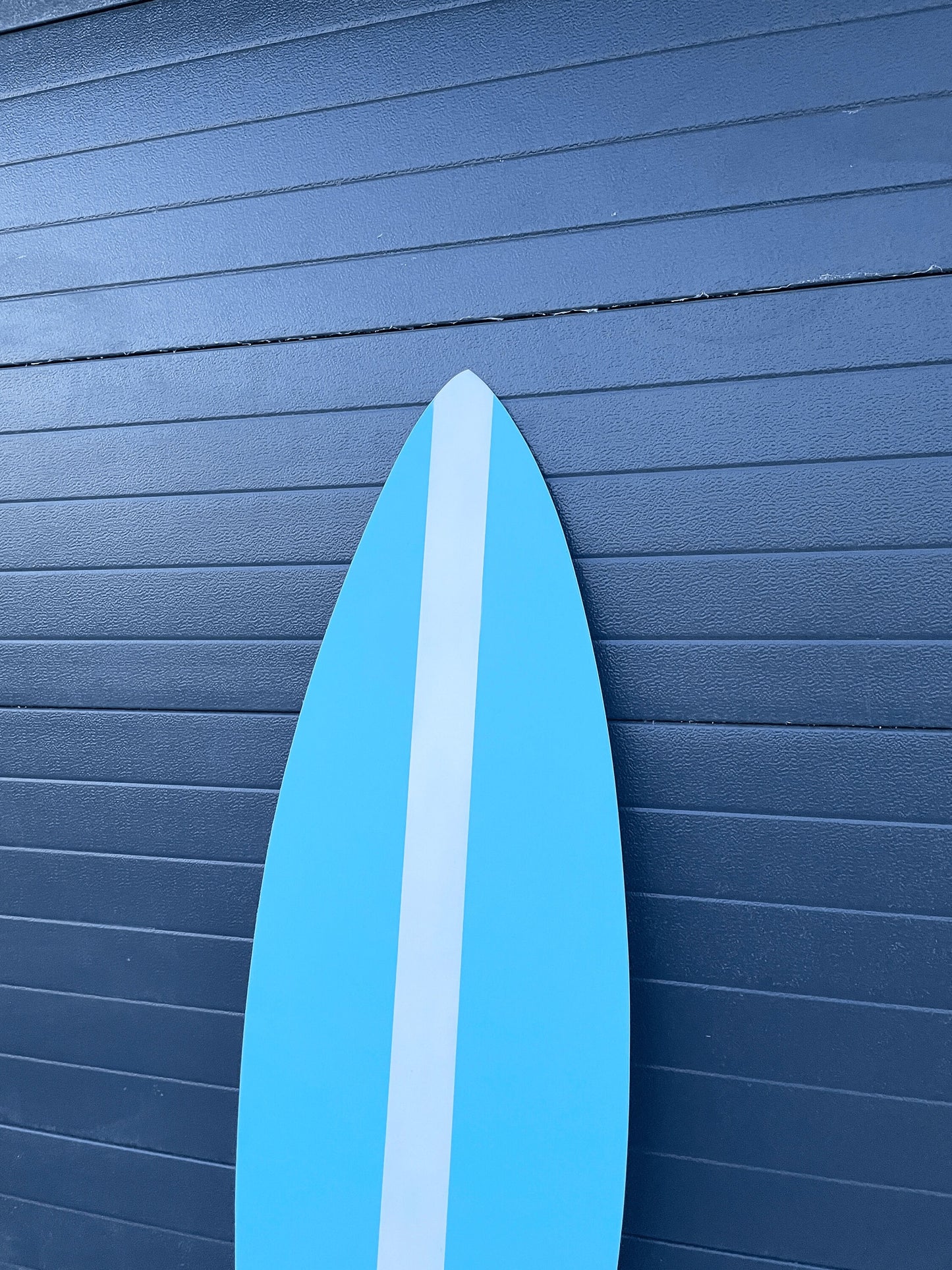 Gentle waves of charm: Baby blue decorative surfboard