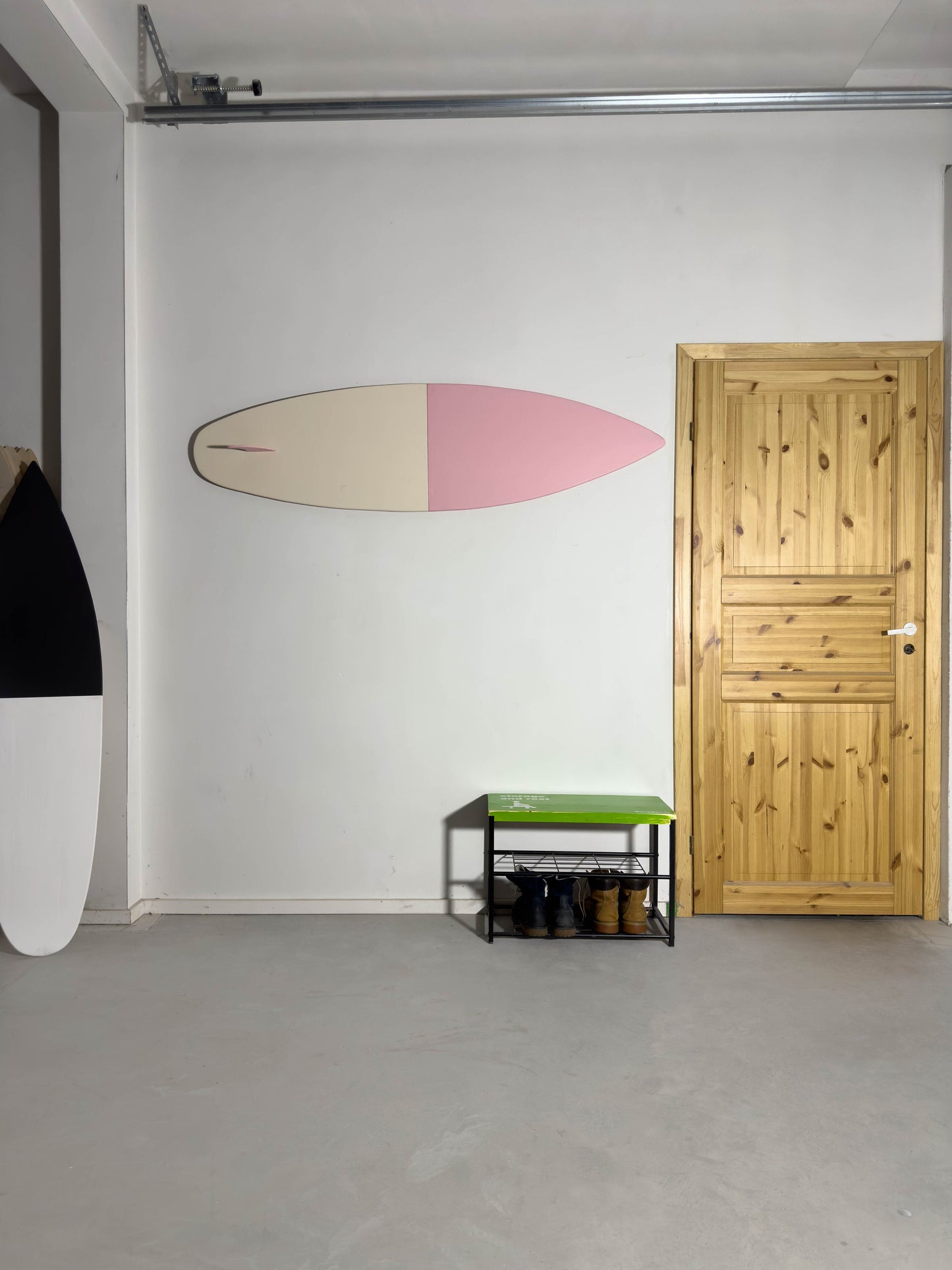 Pretty in pink: a boho-inspired surfboard accent for stylish spaces