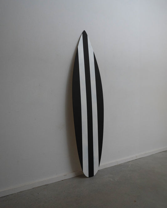 Chic black surfboard, a timeless accent for your space